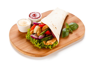 Tortilla wraps with meat and vegetables