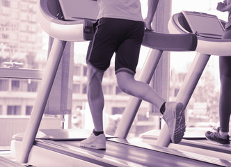 Fototapeta na wymiar sportsman exercise jogging on treadmill