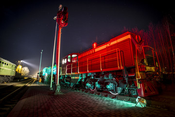 Soviet locomotive train colored at night
