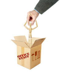 Man takes another person by the head out of the box. Abstract image with a wooden puppet