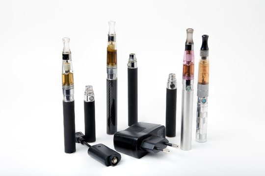 Electronic cigarettes with charger on white background