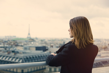 young woman looking at Paris © Masson