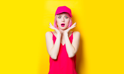 surprised young woman in cap