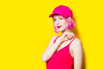 smiling young woman in cap