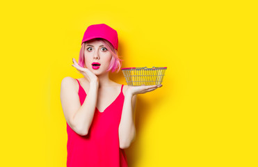 surprised young woman with shopping bag