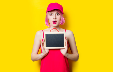 young woman with blackboard