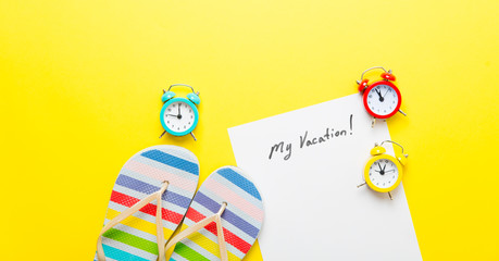 paper My Vacation, alarm clocks and sandals