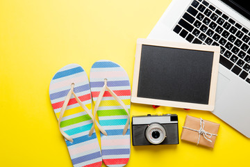 blackboard, sandals, camera, gift and laptop