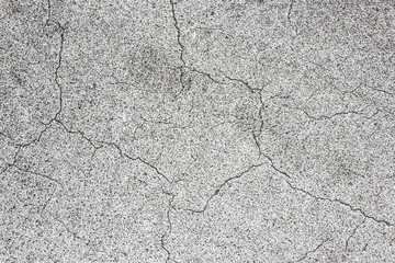 Grunge cracked rough white rock texture.