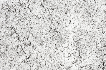 Black and white distressed grunge pattern of rough concrete wall.