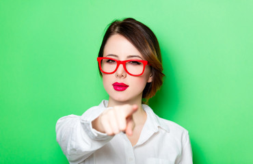 young thoughtful woman in glasses