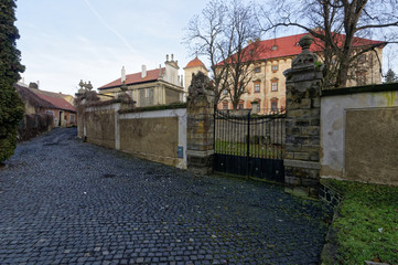 Stone street near the wall with climbers