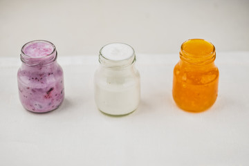 Detox drinks on wooden background