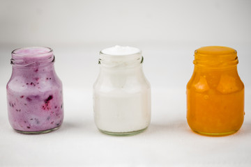 Detox drinks on wooden background