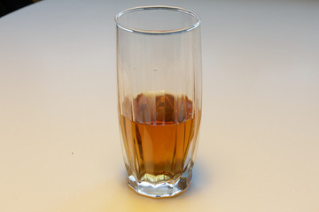 crystal glass of whisky isolated on a white background