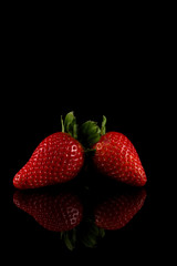 Red ripe strawberry fruits