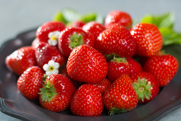 Organic fresh Strawberry. Red strawberry and blossom. Strawberry Juice. Loosely laid strawberries in different positions.