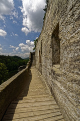 Fototapeta na wymiar Stone steps with the side wall