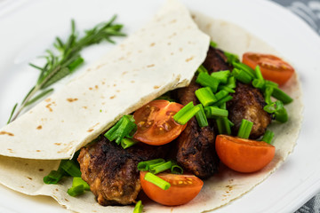 Tasty grilled ribs with vegetable. fried ribs with vegetables