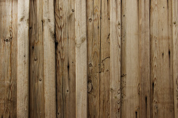 Fototapeta na wymiar Light brown wood texture. Background light old wooden panels.Boards are nailed vertically