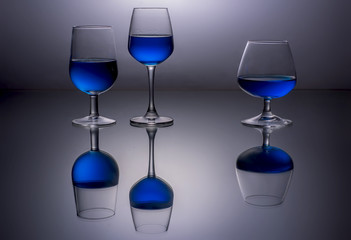 Three blue glasses