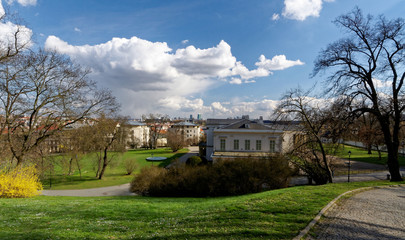 View of the buildings,deciduous trees and lawn