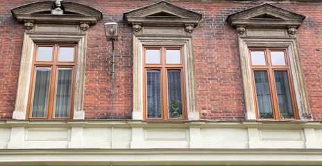 Facade of the old vintage house with a lantern