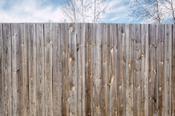 wooden fence against the background of the sky