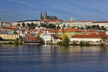Obraz premium View of the storeyed buildings from the lake
