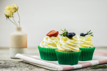 With berry the cupcake isolated on white
