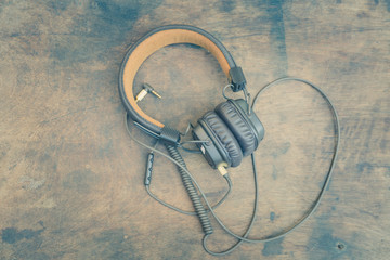 The vintage headphones for listening to music, sound engineering concept