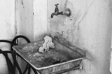 Old dirty metal rusty sink