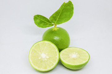 Collection of fresh green limes isolated on white background