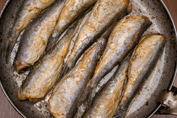 Fried fish herring, Fried fish in a frying pan