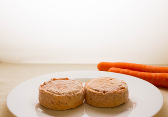 Carrot cutlets on a white plate. The concept of a healthy diet. Vegetarian cuisine.