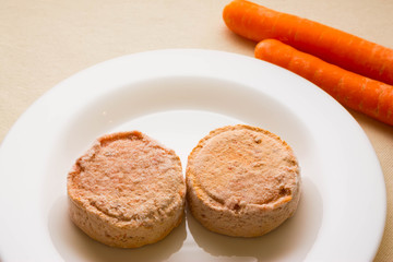 Carrot cutlets on a white plate. The concept of a healthy diet. Vegetarian cuisine.
