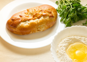 Meat pie with egg and vegetables. Nutritious and tasty dish.