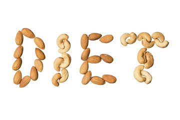 Nuts on white isolated background. The word diet of nuts. The concept of dietary nutrition.