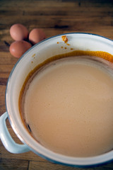 Preparing dessert creme brulee