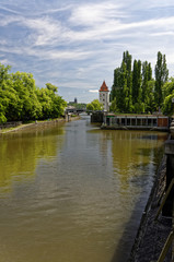 River flows between the side walls