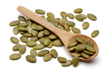 Pumpkin seeds with wooden spoon