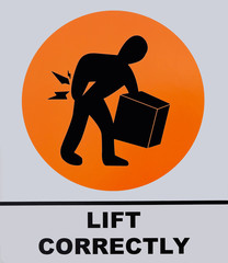 Lift correctly sign isolated on white background. This photo was taken from the sign board, it is not an illustration work.