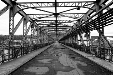Fototapeta na wymiar Black and white picture of road in the bridge