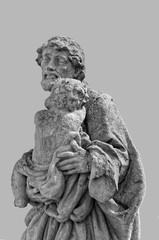 Fototapeta premium Statue of Jesus holding the baby