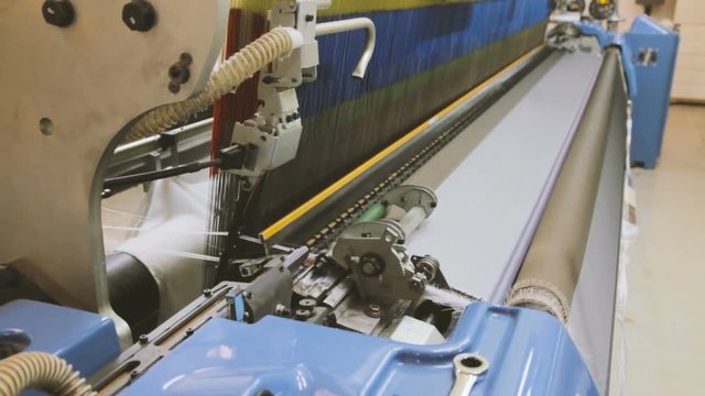 Manufacture Industrial Textiles Production Line with Automatic Weavers in a Factory