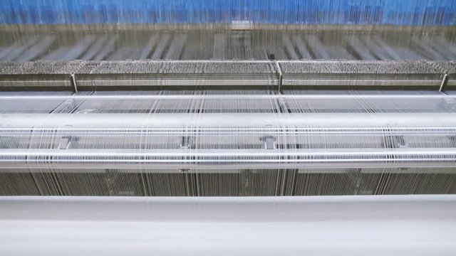 Manufacture Industrial Textiles Production Line with Automatic Weavers in a Factory