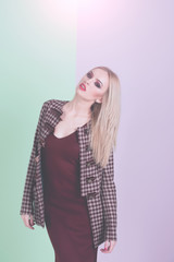 Fototapeta premium beautiful woman with makeup in dress and fashionable coat