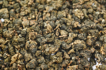 Surface coated with tea leaves