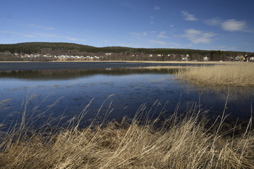 Lake with blue water and and ice remaining from the winte
