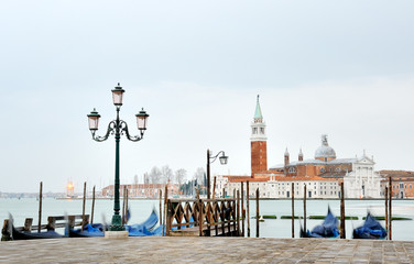 Fototapeta na wymiar Venice, Italy, Europe - picturesque view of gondolas and lamp